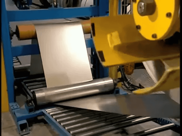 An In-Depth Look at How Garage Doors Are Made 2 Sheet of aluminum or steel being prepared for production