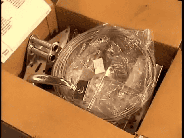An In-Depth Look at How Garage Doors Are Made 7 Packaged installation hardware and boxed panels ready for shipment