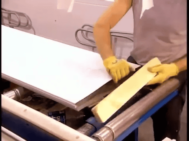 An In-Depth Look at How Garage Doors Are Made 5 Two sheets sliding together and end blocks being inserted